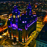 Buy canvas prints of Illuminated historic building at night in urban skyline in Liverpool, UK. by Man And Life