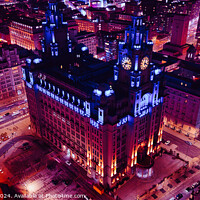 Buy canvas prints of Aerial night view of an illuminated historic building in an urban setting with city lights in Liverpool, UK. by Man And Life
