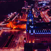 Buy canvas prints of Aerial night view of a cityscape with illuminated streets and buildings in Liverpool, UK. by Man And Life