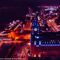 Buy canvas prints of Aerial night view of a vibrant cityscape with illuminated streets and buildings in Liverpool, UK. by Man And Life