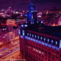 Buy canvas prints of Aerial night view of a vibrant cityscape with illuminated buildings and streets in Liverpool, UK. by Man And Life