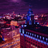 Buy canvas prints of Cityscape at night with illuminated buildings under a moonlit sky in Liverpool, UK. by Man And Life