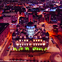 Buy canvas prints of Aerial night view of an illuminated cityscape with historic architecture in Liverpool, UK. by Man And Life