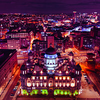 Buy canvas prints of Aerial night view of a cityscape with illuminated buildings and vibrant urban lights in Liverpool, UK. by Man And Life