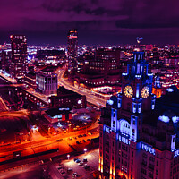 Buy canvas prints of Aerial night view of a vibrant cityscape with illuminated streets and buildings under a purple sky in Liverpool, UK. by Man And Life
