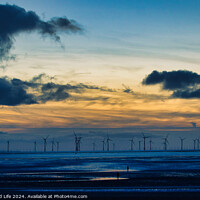 Buy canvas prints of Serene sunset over a wind farm with silhouettes of turbines and dramatic clouds, reflecting on water in Crosby, England. by Man And Life