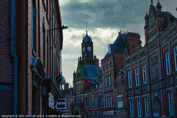 Historic European cityscape with clock tower at dusk, moody sky, and vintage architecture in York, UK. Picture Board by Man And Life