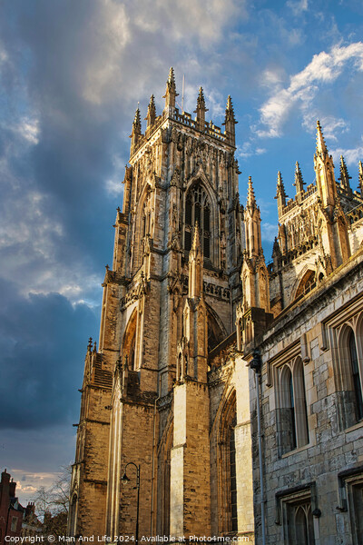 Gothic cathedral against a dramatic sky at sunset in York, UK. Picture Board by Man And Life