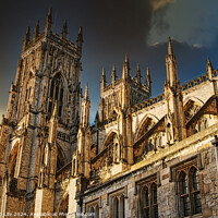 Buy canvas prints of Majestic Gothic cathedral against a dramatic sky at sunset, showcasing intricate architecture and historical grandeur in York, UK. by Man And Life