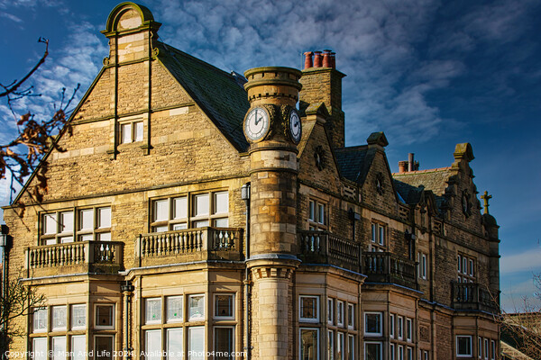 Historic stone building with clock tower under blue sky in Harrogate, England. Picture Board by Man And Life