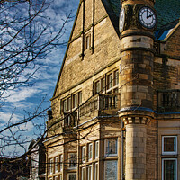 Buy canvas prints of Historic building with clock tower under blue sky with clouds in Harrogate, England. by Man And Life