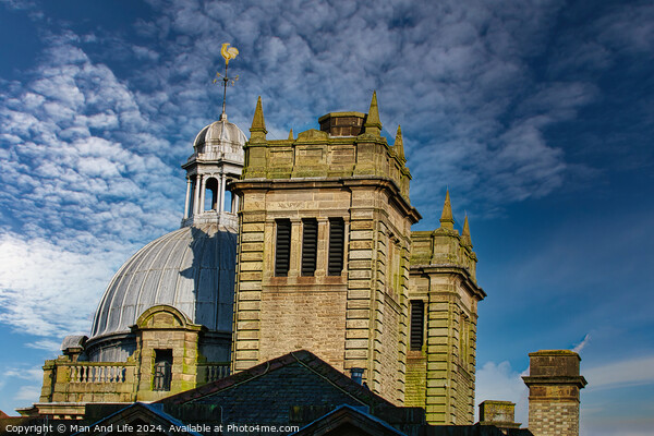 Historic stone building with a dome under a blue sky with clouds in Harrogate, England. Picture Board by Man And Life
