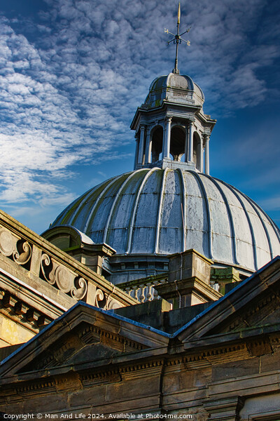 Dome of a classic building against a blue sky with clouds in Harrogate, England. Picture Board by Man And Life