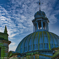 Buy canvas prints of Dramatic sky over an architectural dome with intricate details and historical design in Harrogate, England. by Man And Life