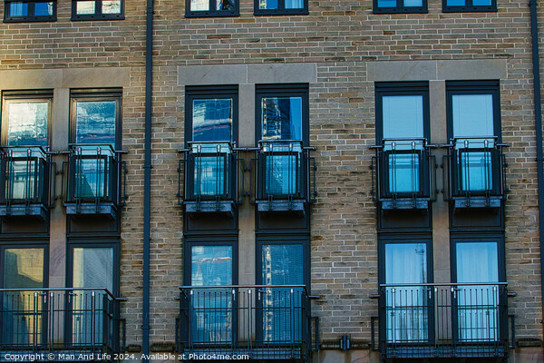 Modern apartment building facade with symmetrical windows and balconies, urban architecture background in Harrogate, England. Picture Board by Man And Life