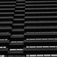 Buy canvas prints of Monochrome image of modern building facade with geometric pattern of windows and ledges, abstract urban background in Leeds, UK. by Man And Life
