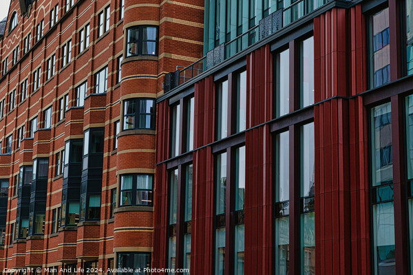 Modern building facade with a pattern of red and brown rectangular windows and panels, architectural background in Leeds, UK. Picture Board by Man And Life