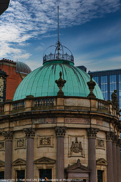 Vintage green dome of a classical building against a blue sky with modern skyscrapers in the background in Leeds, UK. Picture Board by Man And Life