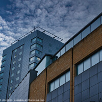 Buy canvas prints of Modern urban architecture with blue sky and clouds in Leeds, UK. by Man And Life