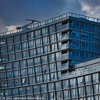Buy canvas prints of Modern office building facade against a dramatic sunset sky in Liverpool, UK. by Man And Life