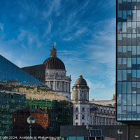 Buy canvas prints of Urban contrast with old dome architecture beside modern glass building under a blue sky with wispy clouds in Liverpool, UK. by Man And Life
