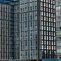 Buy canvas prints of Modern glass skyscrapers with a pattern of windows, reflecting urban architecture in Liverpool, UK. by Man And Life