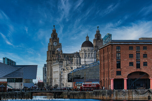 Liverpool waterfront with historic buildings and blue sky Picture Board by Man And Life