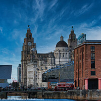 Buy canvas prints of Liverpool waterfront with historic buildings and blue sky by Man And Life