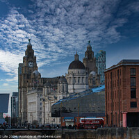 Buy canvas prints of Dramatic sky over historic city buildings with modern architecture in the foreground in Liverpool, UK. by Man And Life
