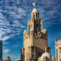 Buy canvas prints of Historic building with a statue on top under a blue sky with clouds in Liverpool, UK. by Man And Life