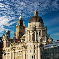 Buy canvas prints of Stunning architecture against a blue sky with dramatic clouds in Liverpool, UK. by Man And Life