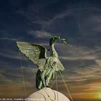 Buy canvas prints of Bronze statue of an angel with outstretched wings against a vibrant sunset sky in Liverpool, UK. by Man And Life