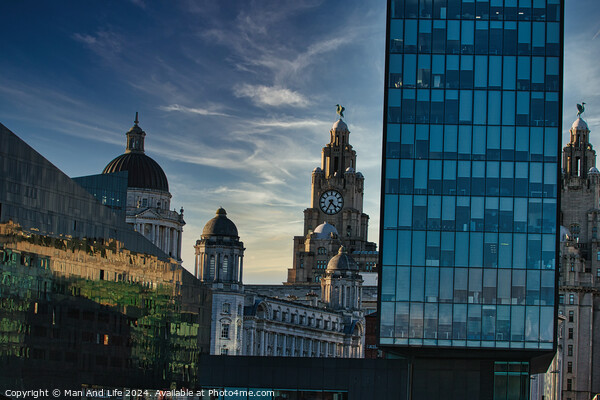 Contrast of old and new architecture with historic domes beside a modern glass skyscraper against a dusk sky in Liverpool, UK. Picture Board by Man And Life