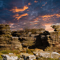 Buy canvas prints of Dramatic sky at sunset over rugged rock formations in a serene landscape at Brimham Rocks, in North Yorkshire by Man And Life