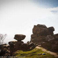 Buy canvas prints of Misty landscape with balancing rock formations and a clear path under a bright sky at Brimham Rocks, in North Yorkshire by Man And Life