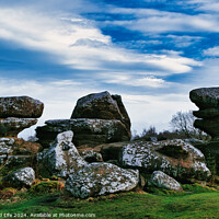 Buy canvas prints of Scenic view of unique rock formations under a blue sky with clouds at Brimham Rocks, in North Yorkshire by Man And Life