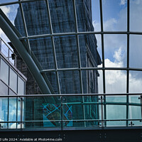 Buy canvas prints of Modern glass building facade with reflections of clouds, showcasing contemporary architecture and design in Leeds, UK. by Man And Life