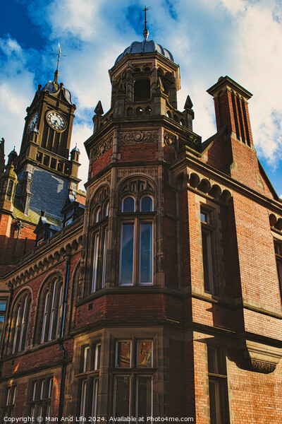 Victorian architecture with a clock tower under a blue sky, showcasing intricate brickwork, historical design, and a sense of timeless elegance in York, North Yorkshire, England. Picture Board by Man And Life