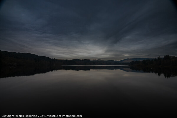 Sunset over a the lake in Brecon Beacons  Picture Board by Neil McKenzie