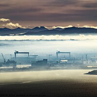 Buy canvas prints of Belfast Harbour Cranes and Mourne Mountains by ANDY MORROW