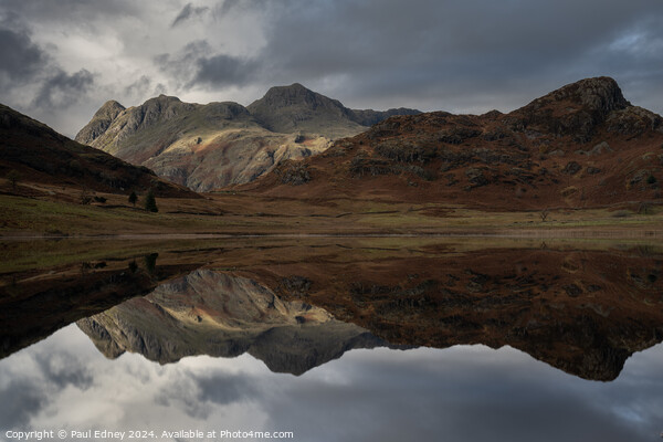 Moody reflections in Blea Tarn, Lake District, Eng Picture Board by Paul Edney