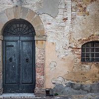 Buy canvas prints of Stately aged door in Tuscany by Paul Edney