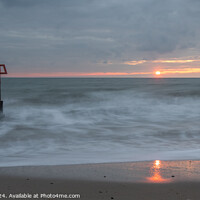 Buy canvas prints of Sun reflecting on Swanage beach at dawn, Dorset, E by Paul Edney
