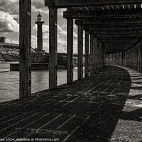 Buy canvas prints of Under Whitby West pier monochrome by Paul Edney