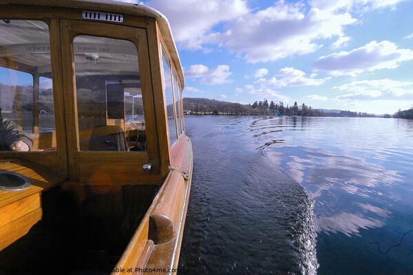 Wooden boat cruising on Windermere, Lake Distict. Picture Board by Phil Brown