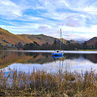 Buy canvas prints of A yacht moored on Ullswater, Lake District, Cumbria. by Phil Brown