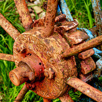 Buy canvas prints of Very rusty horse drawn, hay rake wheel hub. by Phil Brown