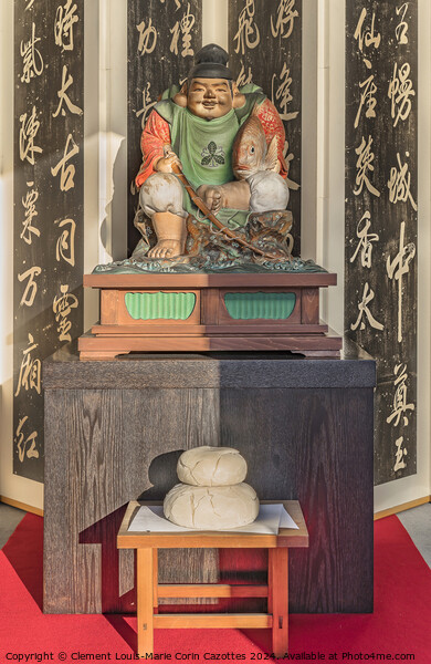 Wooden statue of Ebisu above a kagami-mochi rice cake. Picture Board by Clement Louis-Marie Corin Cazottes