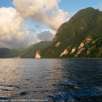 Buy canvas prints of Gros Piton and distant Petit Piton are viewed from the Caribbean Sea. by Robert Waltman