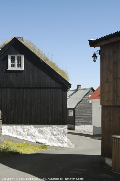 Traditional Faroese Houses with Grass Roofs in Sunlight Picture Board by FocusArt Flow